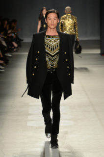 Chen wearing showpiece on the runway at the Balmain x H&M launch event on October 20, 2015 in New York City. (Photo by Joe Schildhorn/BFA.com For H&M) © BFA
