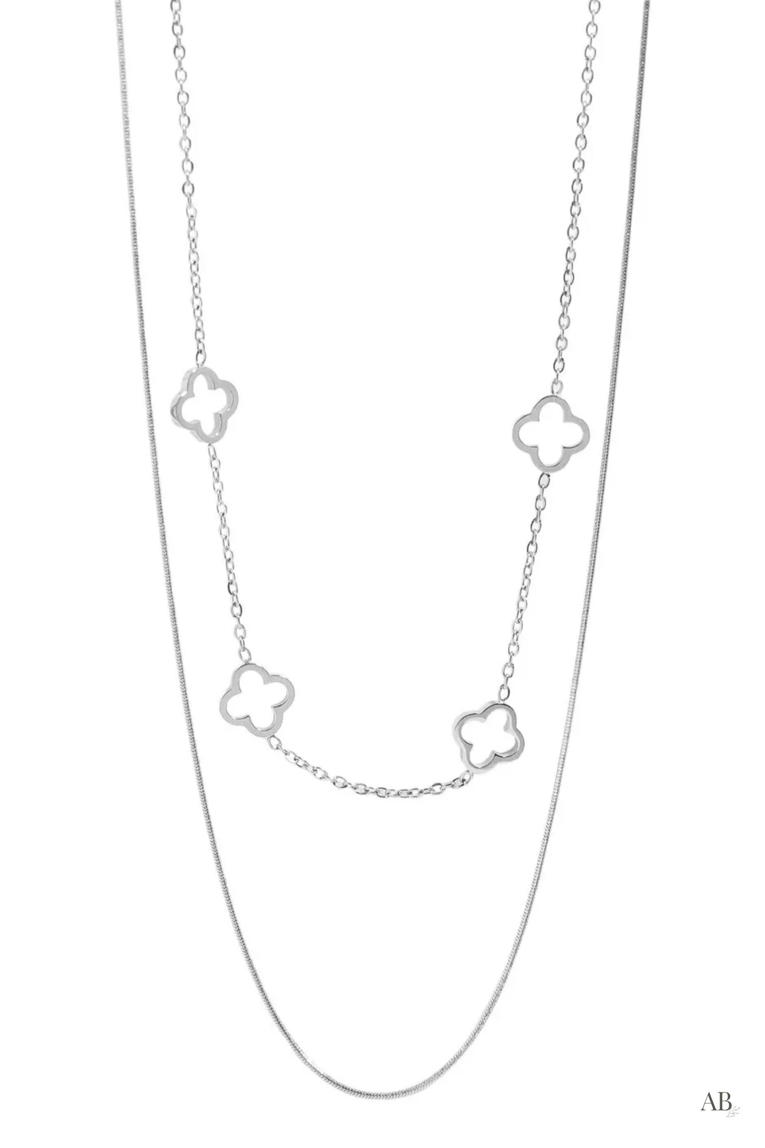 Tarnish-free double chain silver necklace combining a sleek snake chain and four open clover charms on a single clasp.