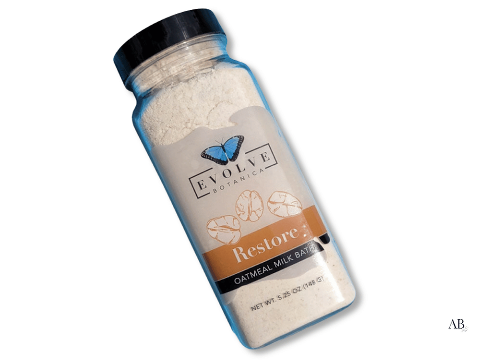 Evolve Botanica Restore oatmeal milk bath, bottle isolated on a white background.