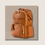 Thumbnail: Angled front view of Itzy Ritzy Cognac Boss Plus Backpack showing tassel and front compartments