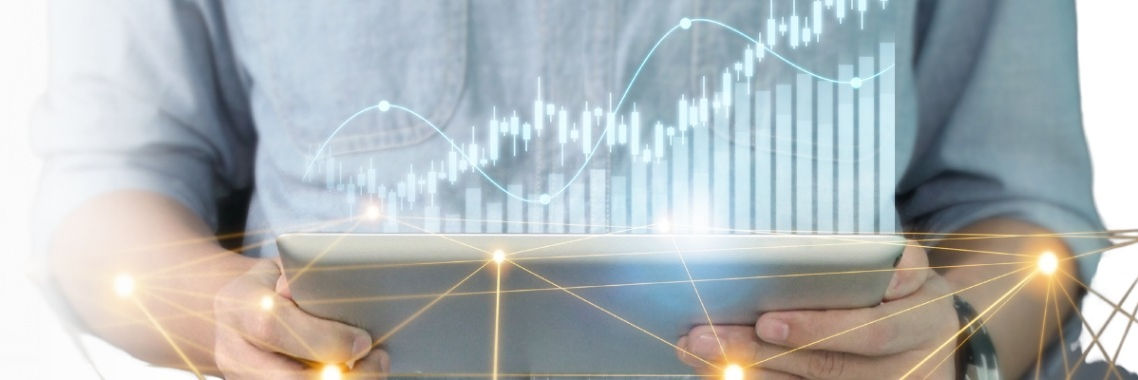 Person holding a tablet with a budgeting/forecasting overlay