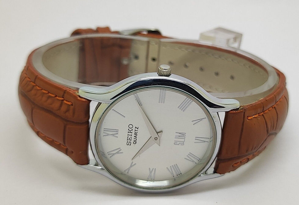 Thumbnail: Seiko Slim Quartz White Face Tan Croco Strap Japanese Man's Wrist Watch B37