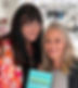 Author DeLinda Forsythe holding her book standing with Barbara Chodos
