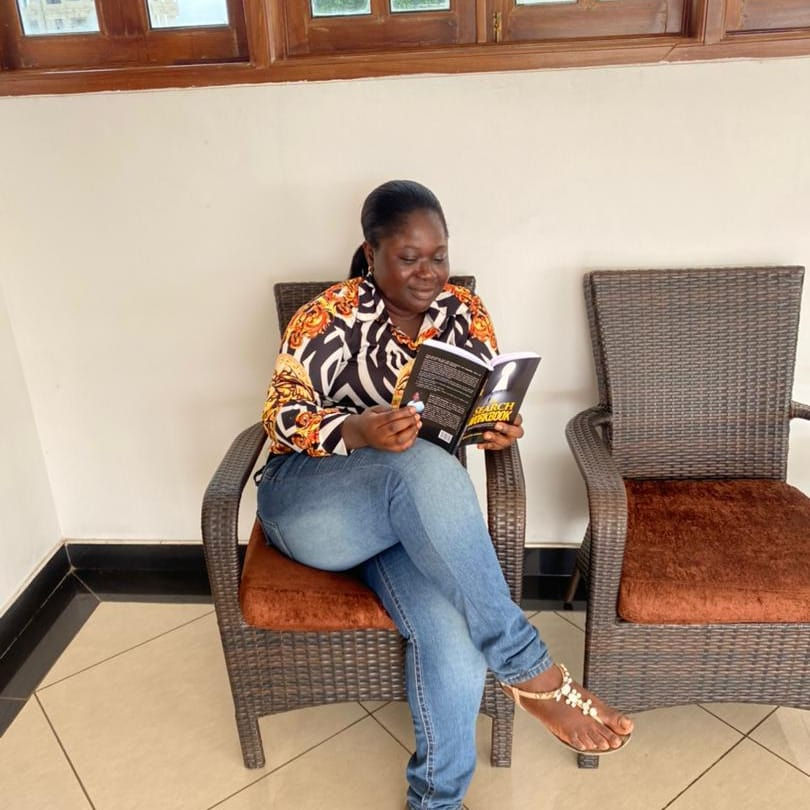 Brigitte Adofo Agyapong reading The Search Wrkbook