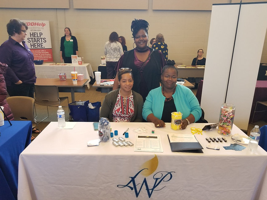 Provider Fair Staff and table pic.jpeg