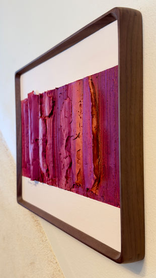 a framed painting with a purple and orange stripe