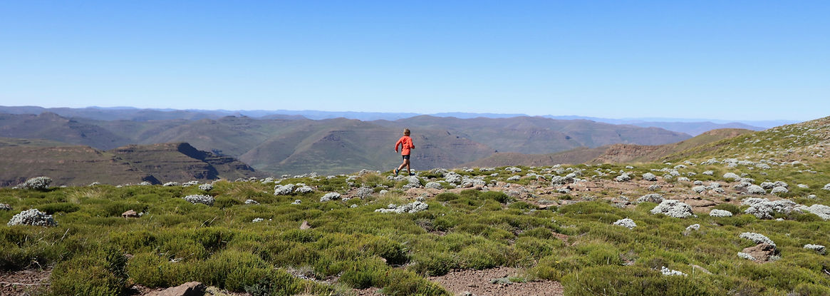 a runner in the mountains