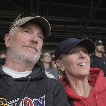 Richard and his wife Sandra, enjoying a Red Sox game at Fenway Park. They actually won the tickets at WRWA's Gala auction!