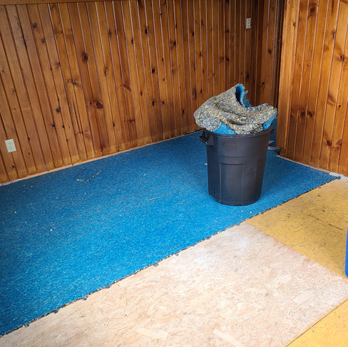 Carpet pad being removed