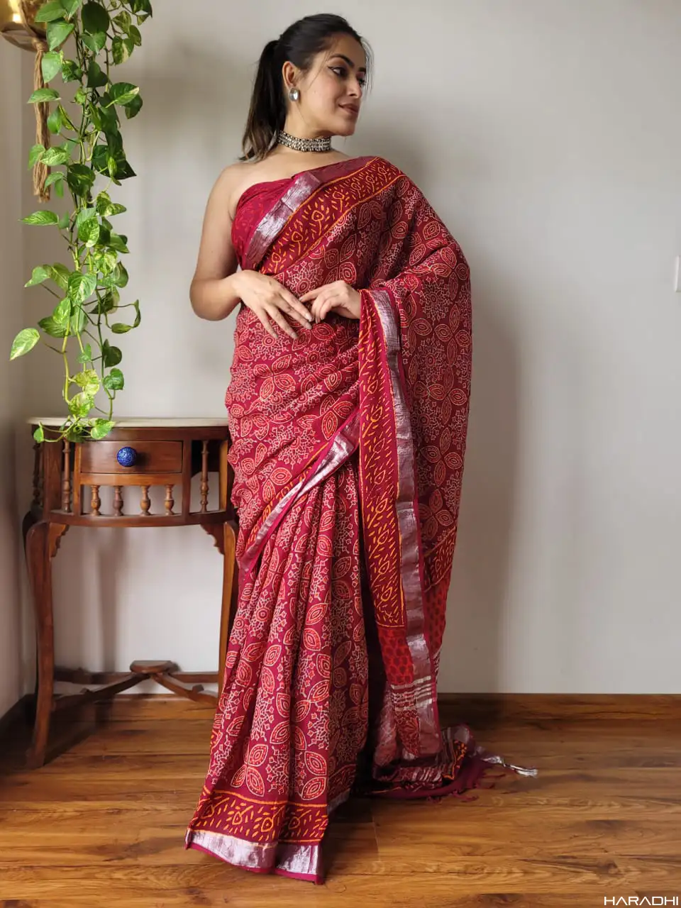 Model Worn image of Scarlet Red Floral Linen Cotton Saree front view.