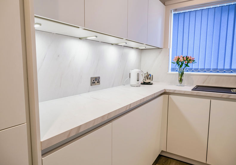 bespoke german kitchen with white marble worktop