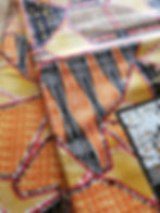 Miniaturbild: Patchwork de Woodin - orange/braun