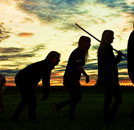 Women in different stances looking like they are evolving