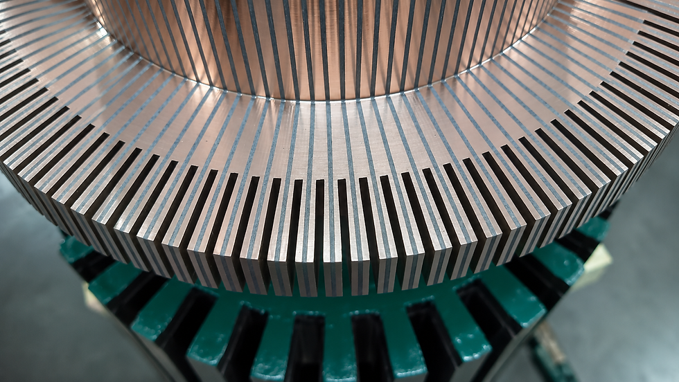 Detail of commutator segments for a DC motor, showing the contact area with carbon brushes and surface finishing.