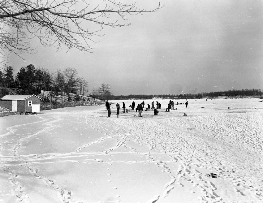 Photo from the Stevens Point Journal. Caption from 1/10/1950. Operation McDill - Upper photo is the general view of McDill pond Sunday as ice fisherman turned out in large numbers to try their luck and lures. The pond southeast of the city long has been a favorite fishing ground for local hook and line enthusiasts, both in winter and summer. The view is taken from a point north of Highway 51 and the west side of the pond.