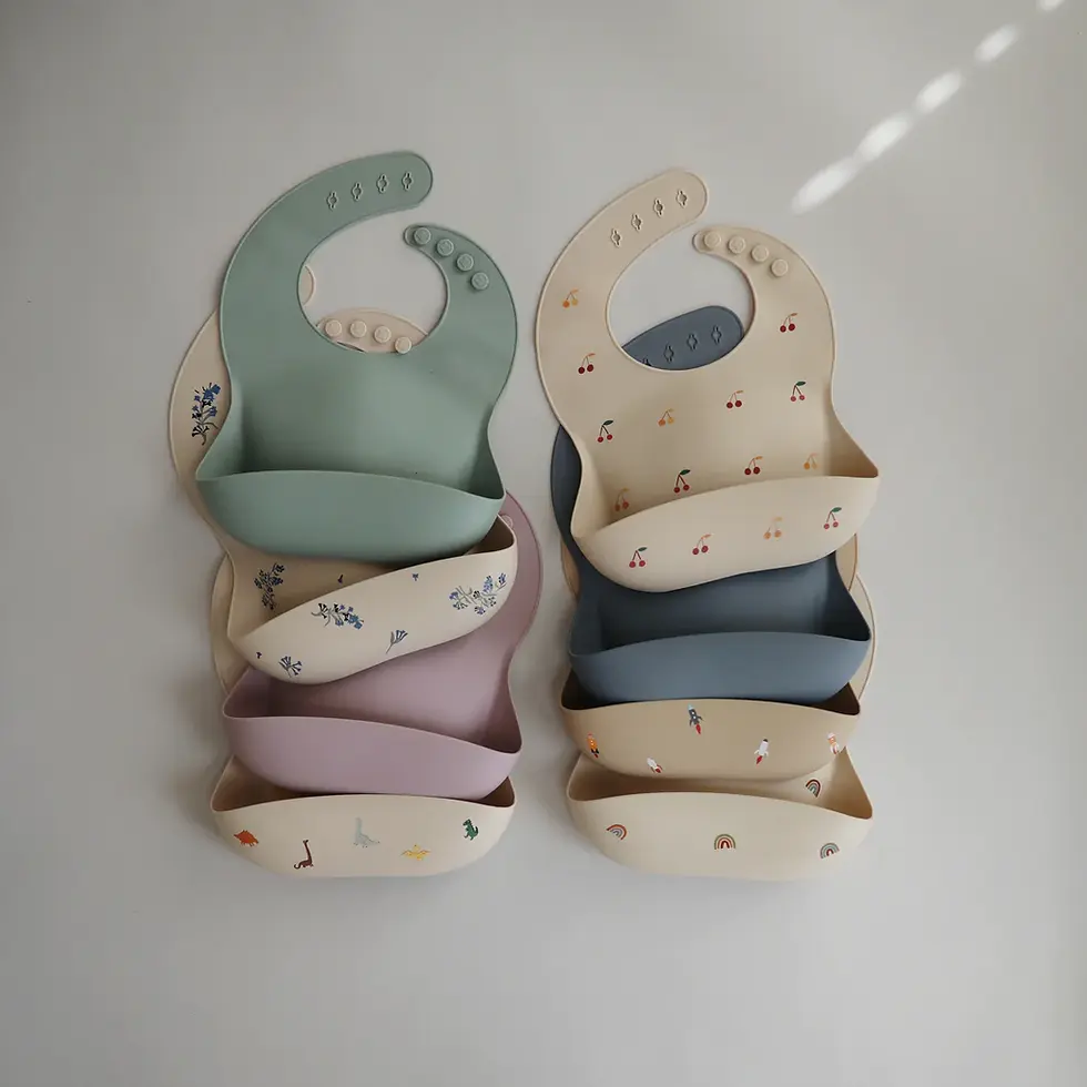Mushie Silicone Baby Patterned Bibs