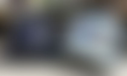 a photo of 2 camo hats with logo embroidery