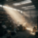 Sunlight streams into a cluttered warehouse filled with stacked boxes and shelves, creating a dusty, atmospheric scene.