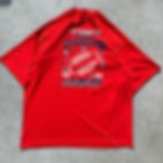 Front of a red football tournament shirt.
