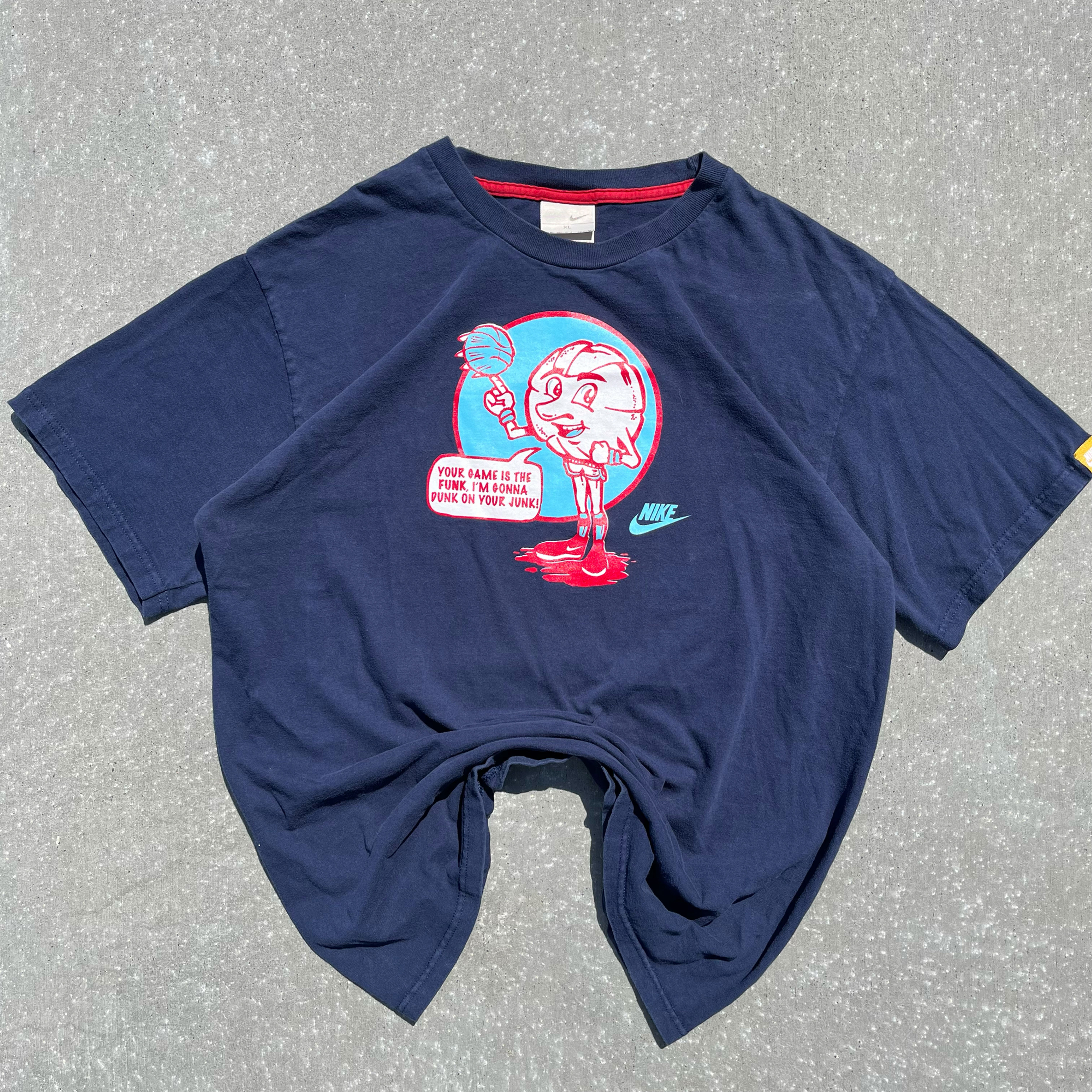 Front of a stylized blue Nike basketball shirt.