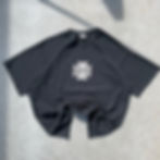 Front of a stylized black West Coast Choppers shirt.