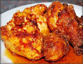 A plate of sticky chicken