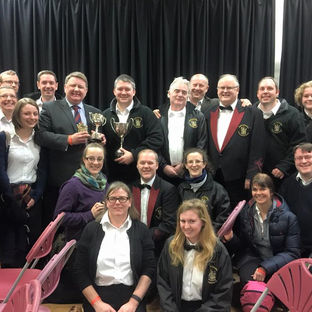 Band with the second section winners trophy and best instrumentalist trophy