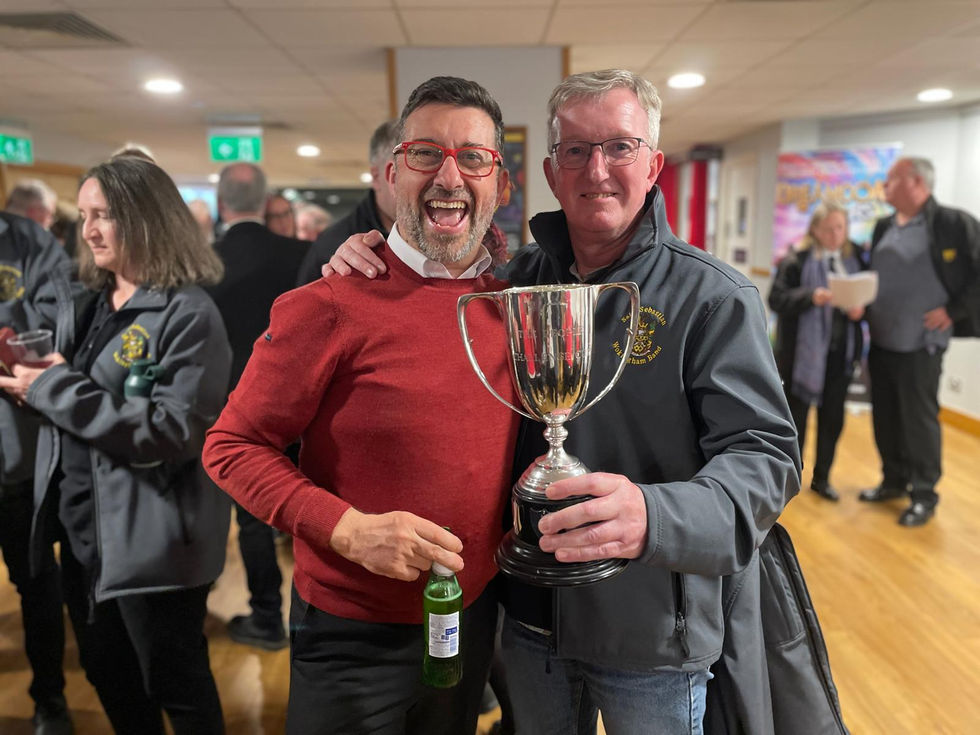 Eb Bass/Percussion Phil and Bb Bass Steve with the trophy