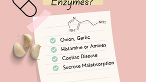 List of food sensitivities on note paper on a pink ground with garlic cloves on the left and a capsule diagram at the top.