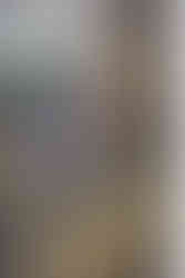 Zach holds a cowboy hat.