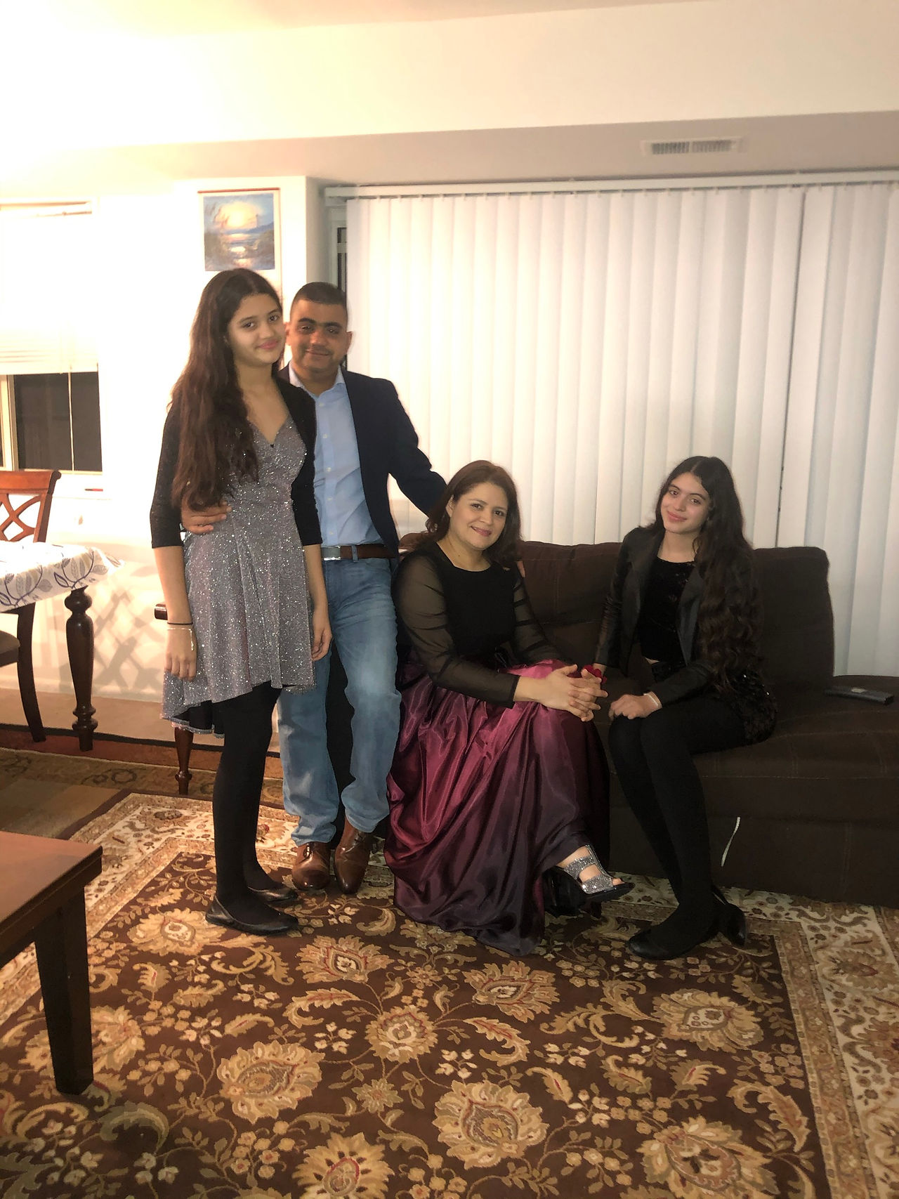 Leo, Lesly, Gaby and Camila dressed formally for a family picture.