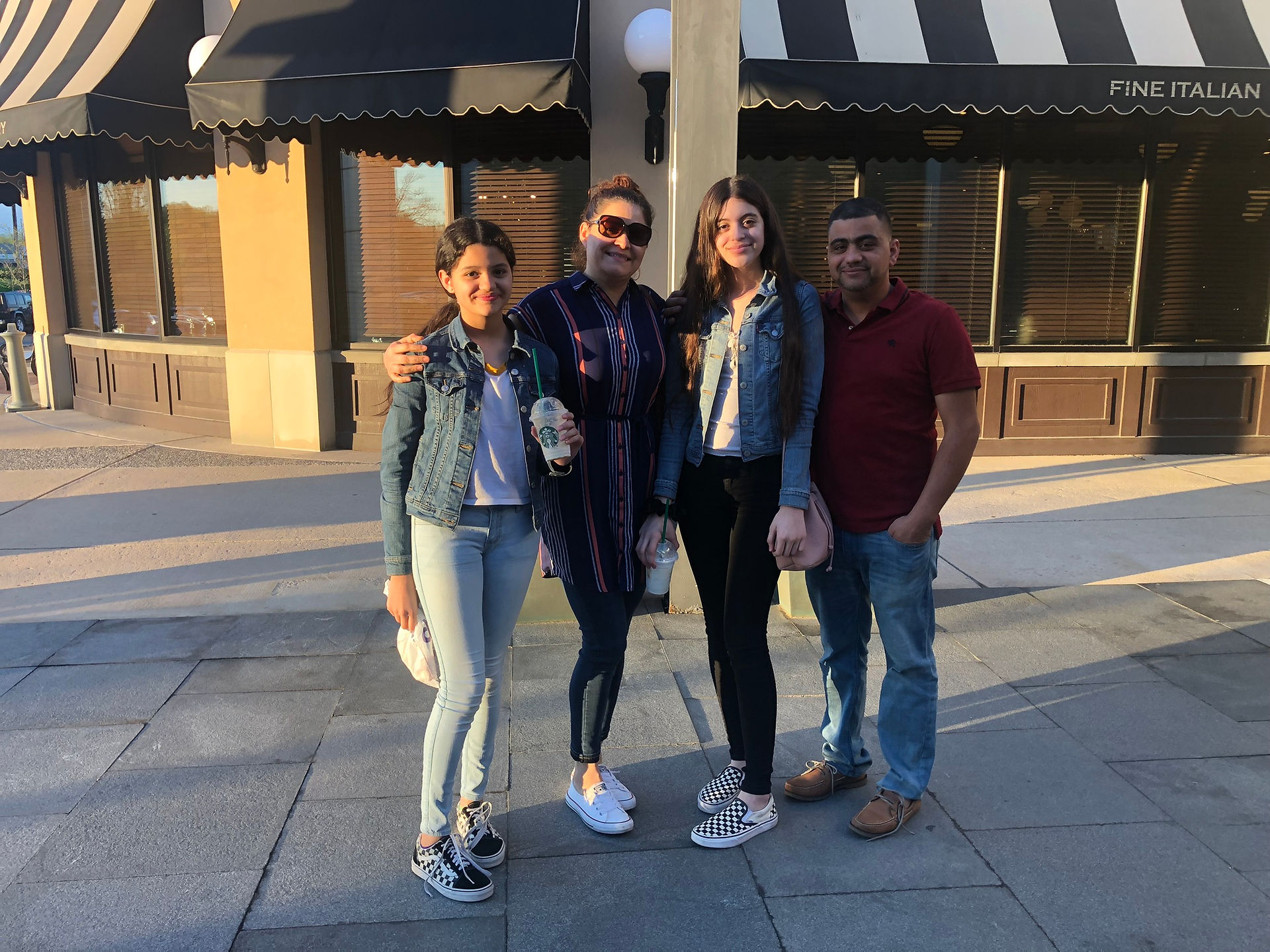 Leo, Lesly, Gaby and Camila outside of a restaurant. 