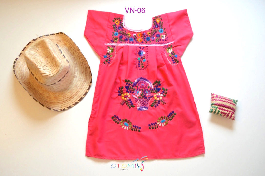 mexican pink dress with floral design