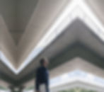 businessman-standing-at-underpass-holding-laptop-2024-09-18-22-03-01-utc (1).jpg