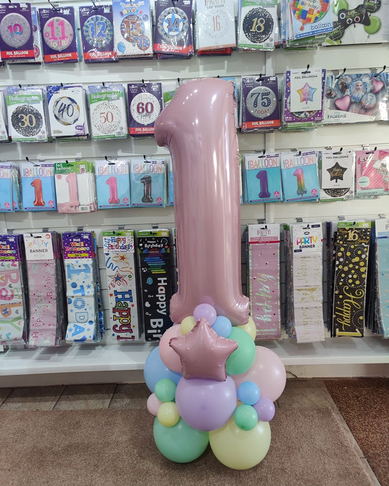 Large pink number one balloon