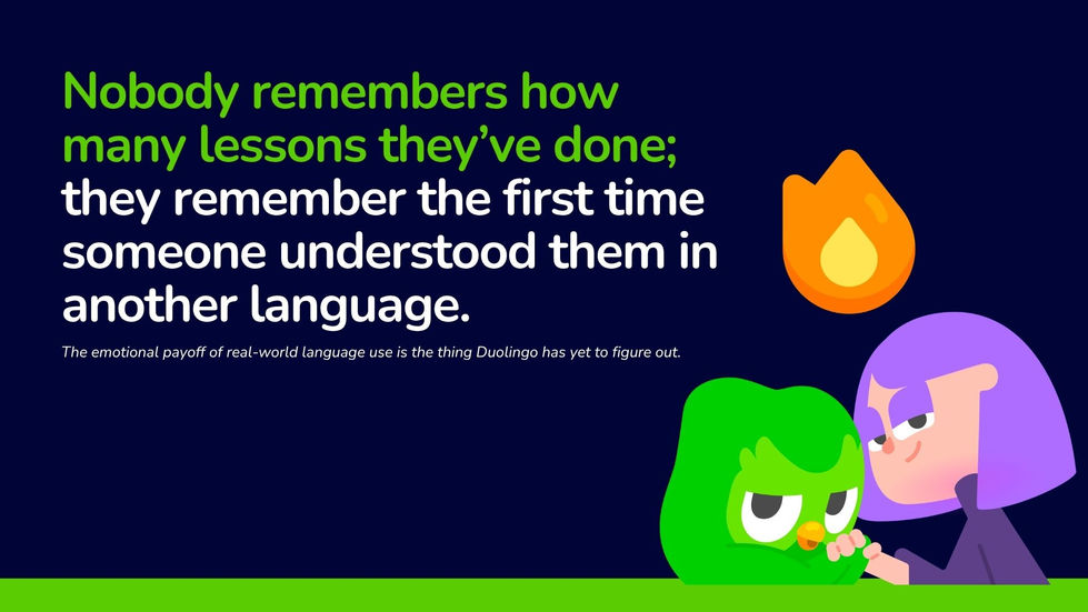 Dark navy slide with green and white text reading "Nobody remembers how many lessons they've done; they remember the first time someone understood them in another language." Duo the Owl and Lily appear in the bottom right corner looking skeptical. A streak flame icon floats above them.