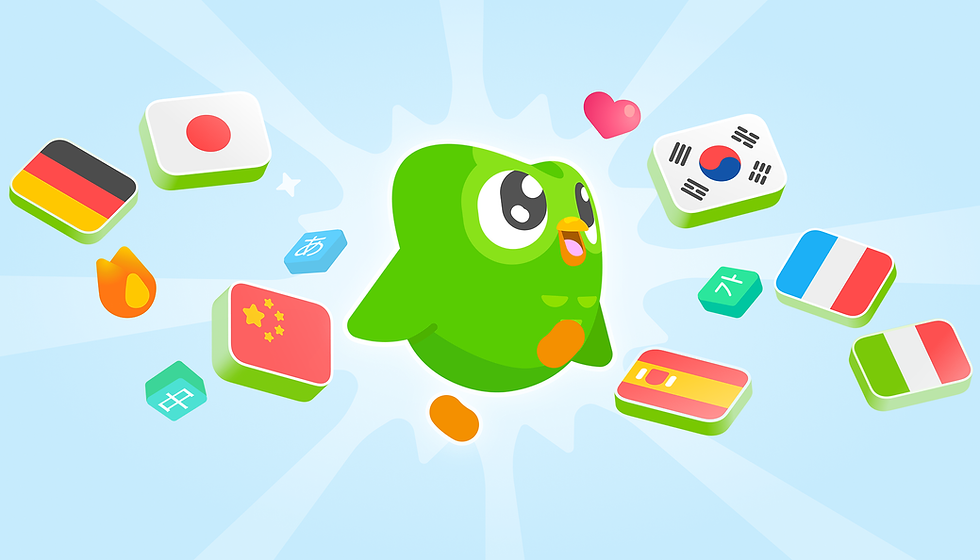 Duolingo's mascot Duo the green owl floats at the center of a colorful illustration surrounded by 3D language course tiles featuring the flags of Japan, Germany, China, South Korea, France, Italy, Spain, and Korean and Japanese character tiles, along with a flame streak icon and a pink heart — representing Duolingo's expanding language course catalog.