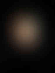 That's how the photo appears at the back of the vintage camera - upside down!