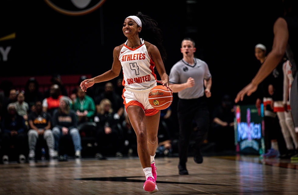 Lexie Brown is all smiles as she competes for Team Orange. Photo Credit: Athletes Unlimited