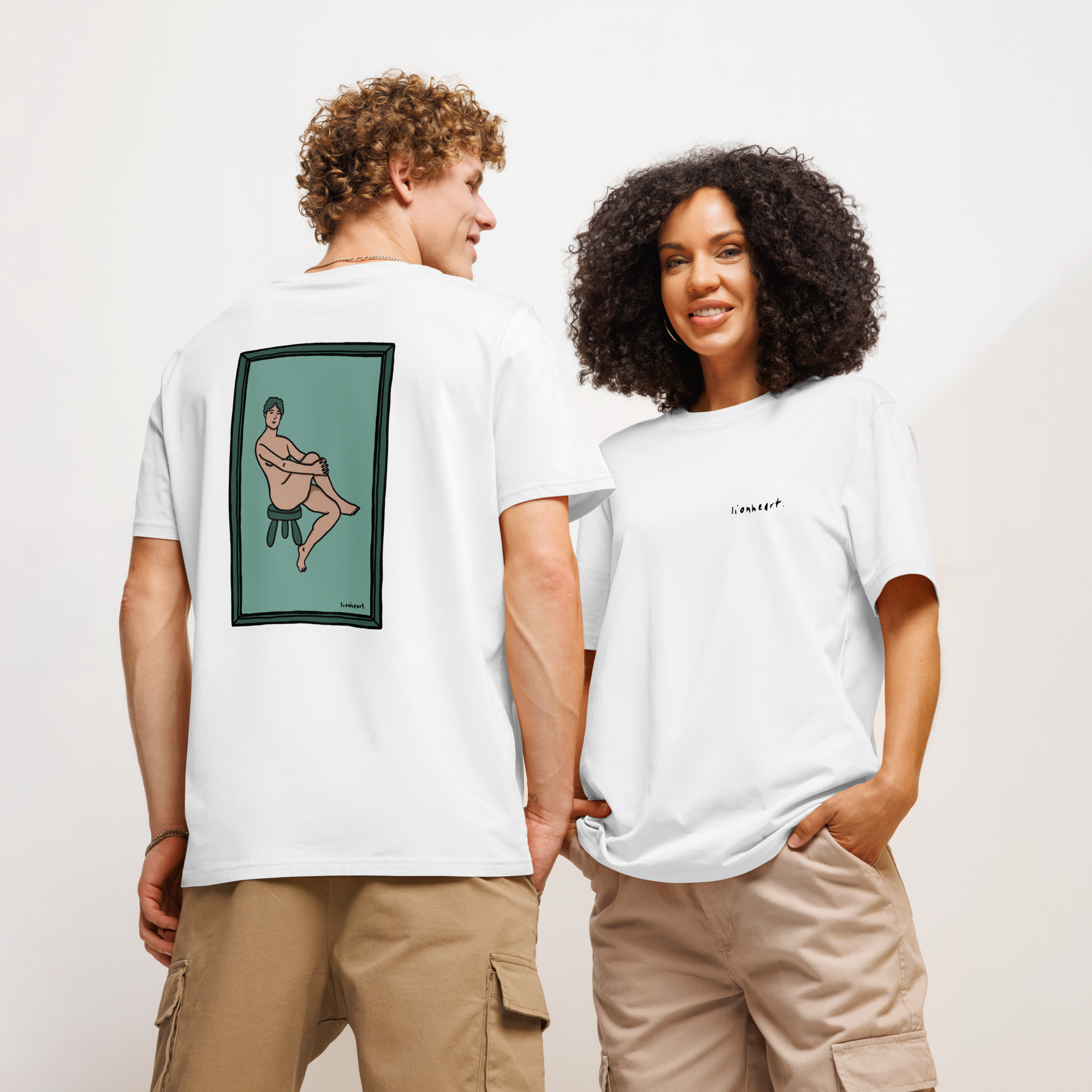 Two people wearing a white t-shirt, front with small logo and back with a Lionheart original illustration