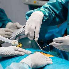 doctors-doing-surgical-procedure-patient.jpg