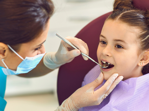Child receives dental examination