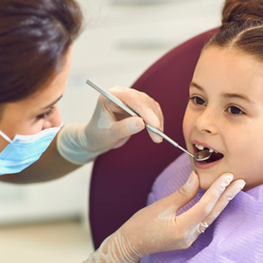 Child receives dental examination