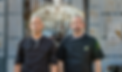 Two man standing in a promotional pose