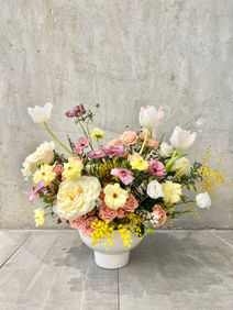  Ivory and pink flower arrangement for upscale restaurant or brunch café
