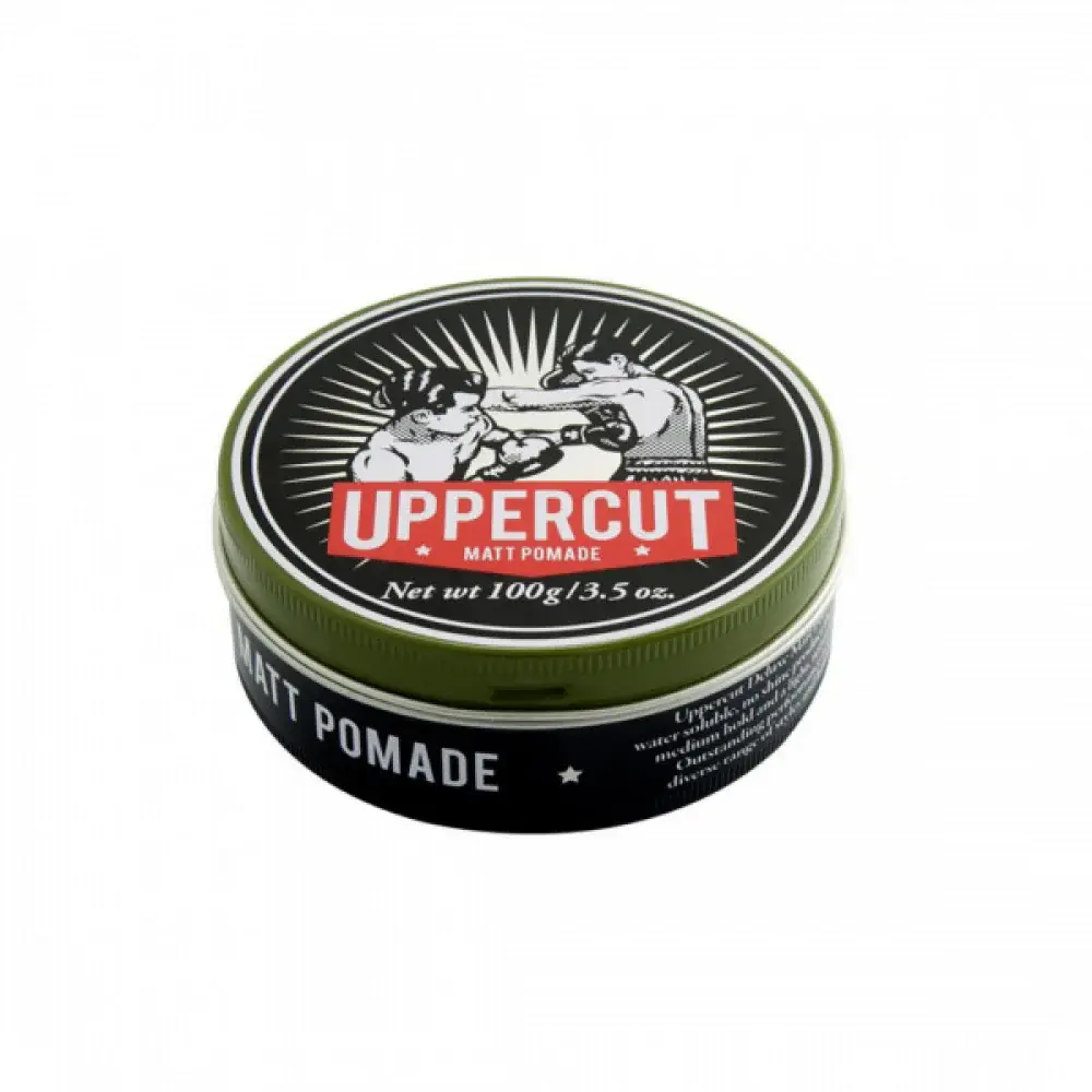 Pomada para el cabello de fijación media-fuerte mate Uppercut Deluxe Matte Pomade de 100g en The Wolf Barbería.