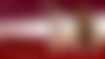 Three boer goats in front of the ABGA logo