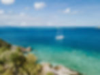 Summer Jo sailing yacht exploring the Whitsundays near the Great Barrier Reef.