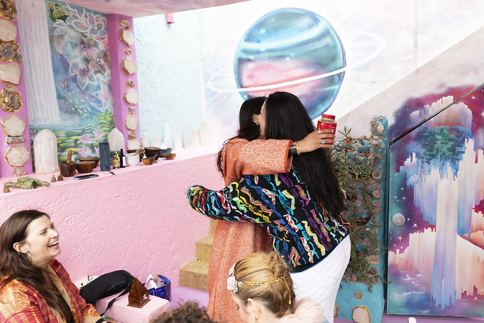 Guests embracing during the grounding workshop at Starseed House Marrakech during Amy Griffith 50th birthday celebration January 2026 — Eaton House Studio