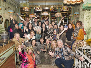 Group photo of guests in leopard print outfits at Amy Griffith 50th birthday Leap of Leopards night Marrakech January 2026